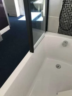 Roman Lumin8 Pivoting Bath Screen - Matt Black Frame 11 Roman Lumin8 Pivoting Bath Screen - Matt Black Frame -Burling Shower Shop Lumin8 Pivoting Bath Screen Image 2